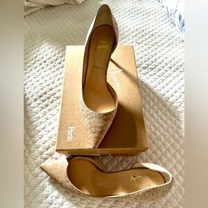 Louboutin  Izira 70 Liege Embosse pumps.